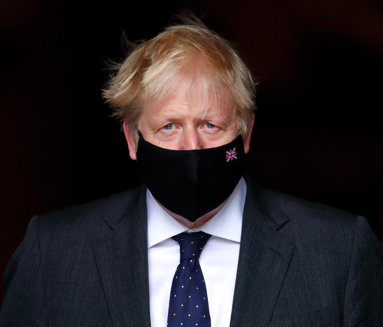 LONDON, UNITED KINGDOM - SEPTEMBER 19: (EMBARGOED FOR PUBLICATION IN UK NEWSPAPERS UNTIL 24 HOURS AFTER CREATE DATE AND TIME) Prime Minister Boris Johnson wears a face mask (bearing a union flag) as he attends the Battle of Britain 81st Anniversary Service of Thanksgiving and Rededication at Westminster Abbey on September 19, 2021 in London, England. (Photo by Max Mumby/Indigo/Getty Images)