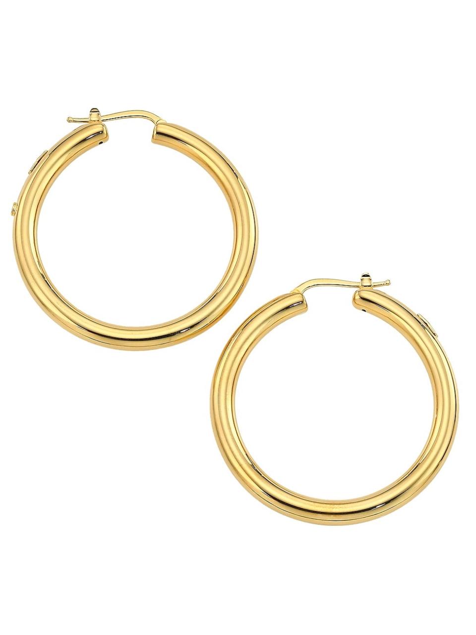 <p><a href="https://go.redirectingat.com?id=74968X1596630&url=https%3A%2F%2Fwww.saksfifthavenue.com%2Fproduct%2Froberto-coin-18k-yellow-gold-round-tubular-hoop-earrings--40mm-0400014888923.html&sref=https%3A%2F%2Fwww.townandcountrymag.com%2Fstyle%2Fg45435300%2Fbest-jewelry-gifts%2F" rel="nofollow noopener" target="_blank" data-ylk="slk:Shop Now;elm:context_link;itc:0;sec:content-canvas" class="link ">Shop Now</a></p><p>18K Yellow Gold Round Tubular Hoop Earrings</p><p>saksfifthavenue.com</p><p>$1700.00</p>