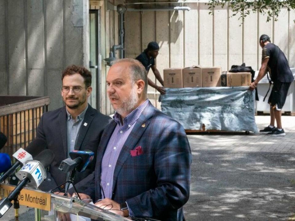Benoit Dorais, vice-chair of Montreal's executive committee, and Vincent Brossard, a  director with Montreal's housing office, spoke at a news conference Tuesday afternoon.   (Radio-Canada/Ivanoh Demers  - image credit)