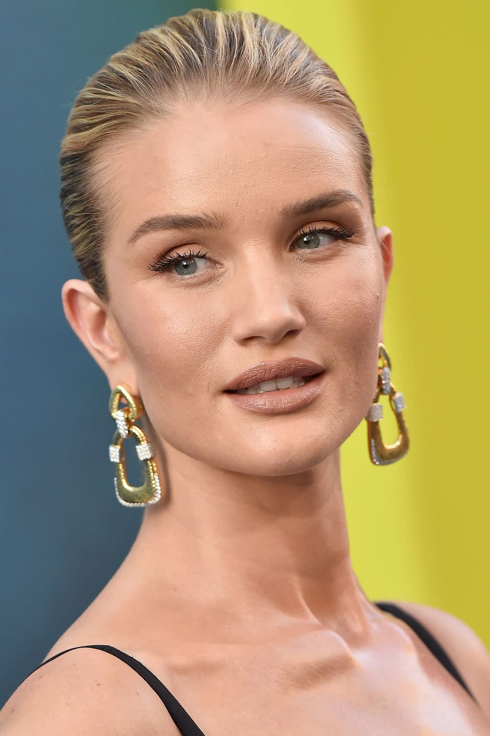 <p>Rosie Huntington-Whiteley is one of the queens of 'no make-up' make-up, because she ensures her neutral-toned products perfectly match her skintone. Her make-up artist Patrick Ta revealed on <a rel="nofollow noopener" href="https://www.instagram.com/p/BmKYx76nOAi/?hl=en&taken-by=patrickta" target="_blank" data-ylk="slk:Instagram;elm:context_link;itc:0;sec:content-canvas" class="link ">Instagram</a> that she uses La Mar's <a rel="nofollow noopener" href="https://www.cremedelamer.co.uk/product/5817/40984/make-up/the-soft-fluid-long-wear-foundation-spf20/weightless-touch-for-luxurious-long-wear?cm_mmc=GoogleBase-_-ShoppingFeed-_-MakeUp-_-TheSoftFluidLongWearFoundationSPF20&gclid=CjwKCAjwhqXbBRAREiwAucoo-88wiRGBzLfLGfFosOUstE0OElwn7BgK5Yynd8gZ1QL1Ms_YyeXEThoC0GIQAvD_BwE&gclsrc=aw.ds&dclid=CNC6-7Lj2twCFQhnAQodySEECA#/shade/Bisque" target="_blank" data-ylk="slk:Soft Fluid Foundation;elm:context_link;itc:0;sec:content-canvas" class="link ">Soft Fluid Foundation</a>, £90, for her flawless base and Maybelline's yet-to-be-released Soda Pop Palette to define her eyes, so use the brand's <a rel="nofollow noopener" href="https://www.boots.com/maybelline-palette-the-nudes-10193897" target="_blank" data-ylk="slk:The Nudes Eyeshadow Palette;elm:context_link;itc:0;sec:content-canvas" class="link ">The Nudes Eyeshadow Palette</a>, £11, in the meantime. Then, for a lip-plumping nude lipstick, try Bobbi Brown's <a rel="nofollow noopener" href="https://www.bobbibrown.co.uk/nude-lips?gclid=CjwKCAjwhqXbBRAREiwAucoo-0lUbziGE-t06NA5m2wRqdmwZcYPTNtX2Ld89dJtGBA9vu3YMKoVlBoCEuwQAvD_BwE&gclsrc=aw.ds&dclid=CP6f7uni2twCFUin7Qodc_oDDg" target="_blank" data-ylk="slk:Lip Color range;elm:context_link;itc:0;sec:content-canvas" class="link ">Lip Color range</a>, £24 each.</p>