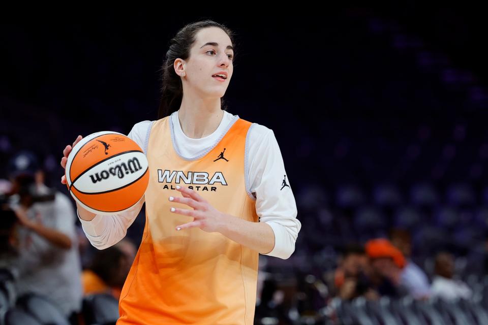 PHOENIX, ARIZONA - JULY 19: Caitlin Clark #22 of Team WNBA looks to pass the ball during a WNBA All-Star Game team practice at Footprint Center on July 19, 2024 in Phoenix, Arizona. NOTE TO USER: User expressly acknowledges and agrees that, by downloading and or using this photograph, User is consenting to the terms and conditions of the Getty Images License Agreement. (Photo by Alex Slitz/Getty Images)