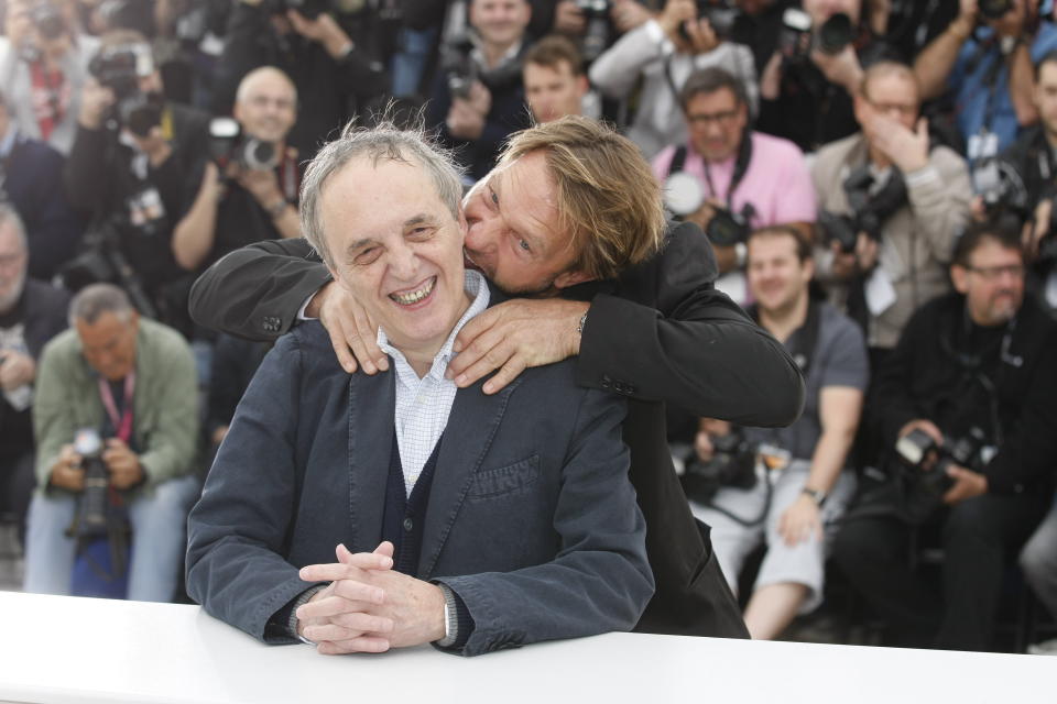 Director Dario Argento, left and actor Thomas Kretschmann interact during a photo call for Dario Argento Dracula at the 65th international film festival, in Cannes, southern France, Saturday, May 19, 2012. (AP Photo/Lionel Cironneau)