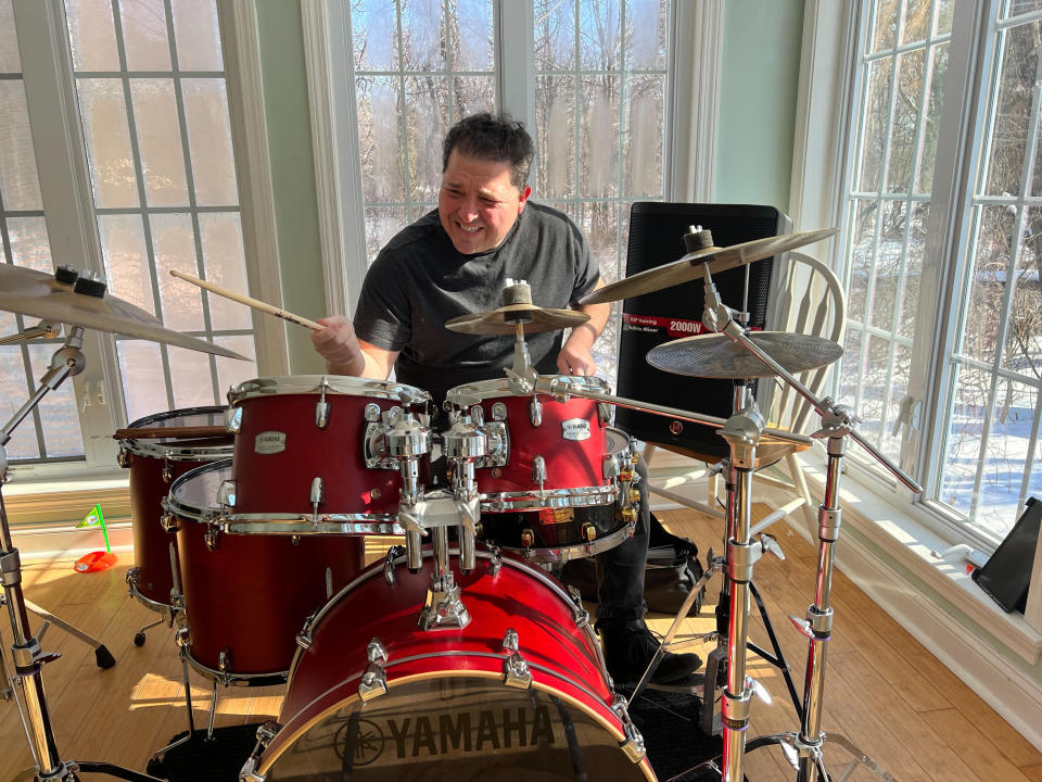 Drummer Paul Sarni, a Dover-Sherborn High grad, practices at home.