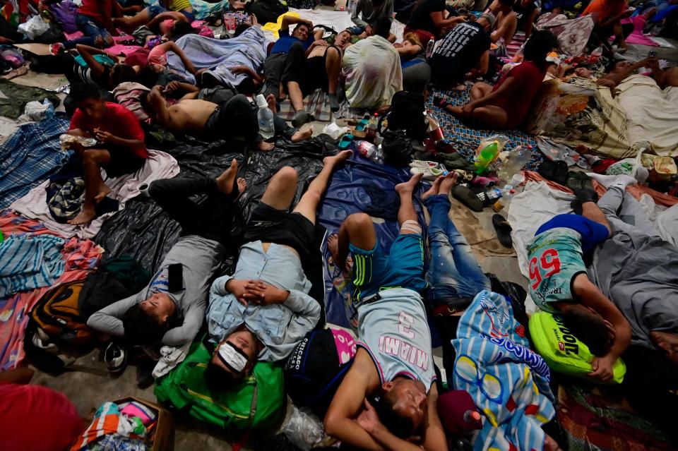 Migrants heading to the U.S.-Mexico border in a caravan rest in in Huixtla, Chiapas state, Mexico, on June 7, 2022.