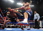 LAS VEGAS, NV - NOVEMBER 12: (R-L) Manny Pacquiao throws a right to the head of Juan Manuel Marquez during the WBO world welterweight title fight at the MGM Grand Garden Arena on November 12, 2011 in Las Vegas, Nevada. (Photo by Harry How/Getty Images)