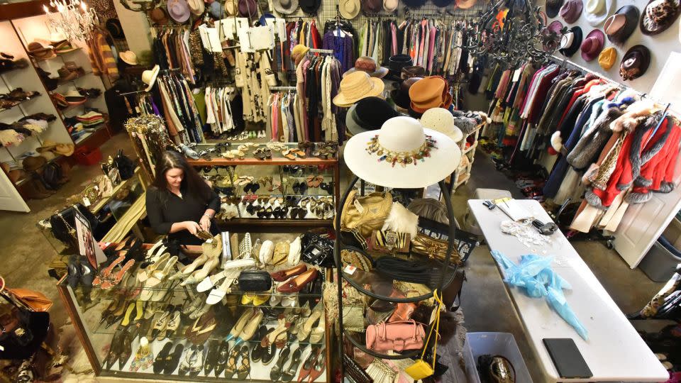 Preparations are shown for the estate sale of Diane McIver's wardrobe, showing her clothing and jewelry items in a warehouse showroom in December 2016 in Atlanta. - Hyosub Shin/The Atlanta Journal-Constitution/TNS/Zuma