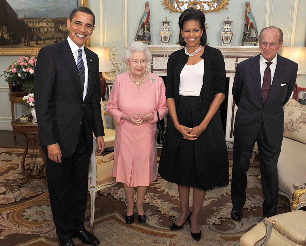 U.S. President Barack Obama (L) and his wife Michelle (2nd R) pose for a photograph with Britain's Queen Elizabeth and Prince Philip, the Duke of Edinburgh, at Buckingham Palace in London April 1, 2009. Obama said on Wednesday there was 