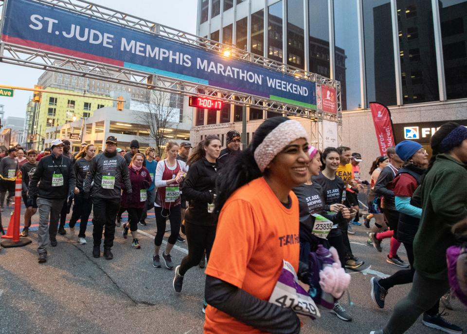 Runners make their way through downtown for the 2019 St. Jude Memphis Marathon Weekend on Saturday, Dec. 7, 2019.