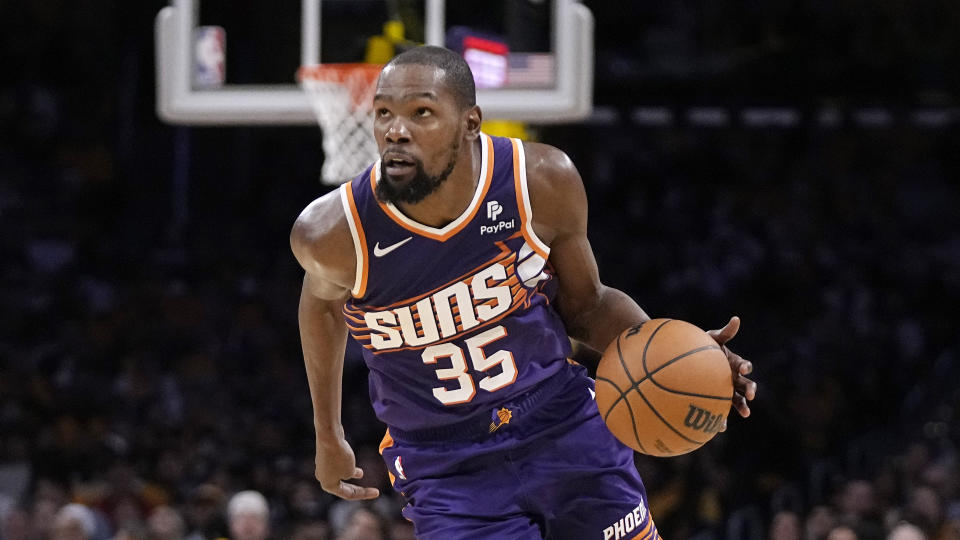 Phoenix Suns forward Kevin Durant drives toward the basket during the second half against the Los Angeles Lakers on Thursday in Los Angeles. (AP Photo/Mark J. Terrill)