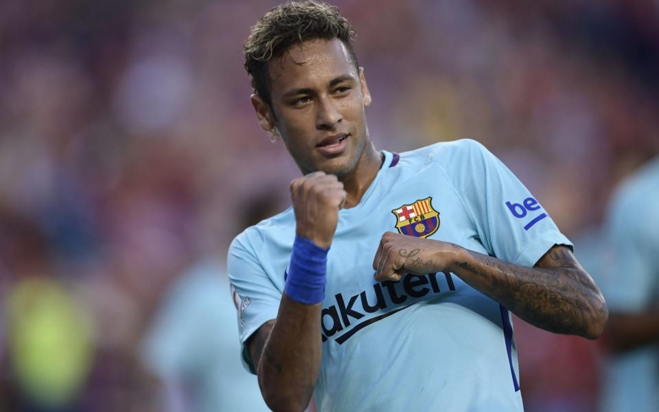 Neymar of Barcelona gestures after scoring against Manchester United - AFP