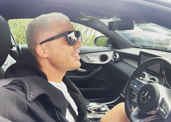 Anthony Callea in selfie in car with sunglasses and blonde buzzcut in January 2020