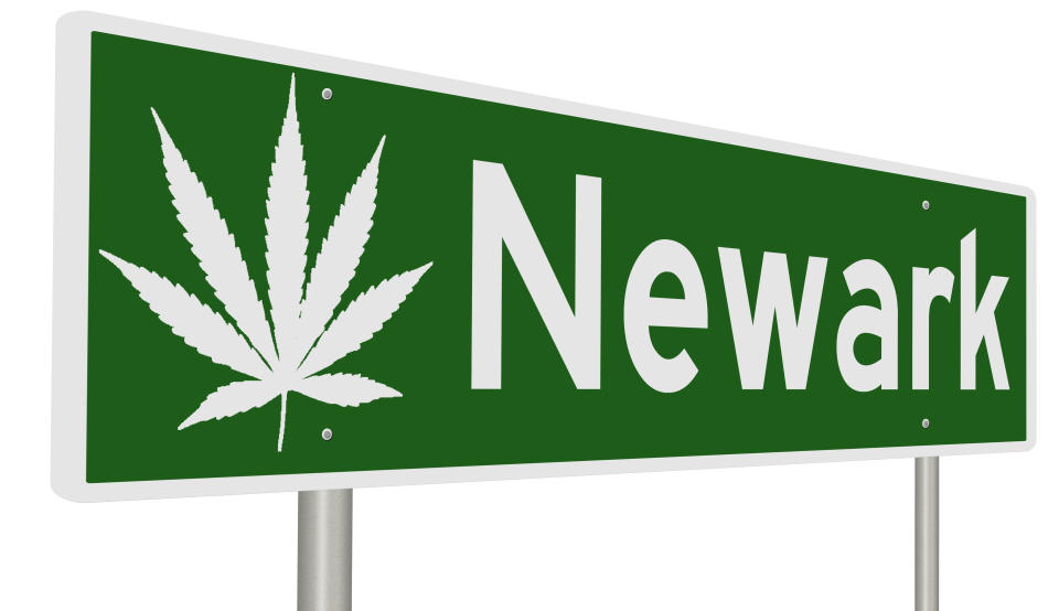 A rendering of a green road sign with marijuana leaf for Newark