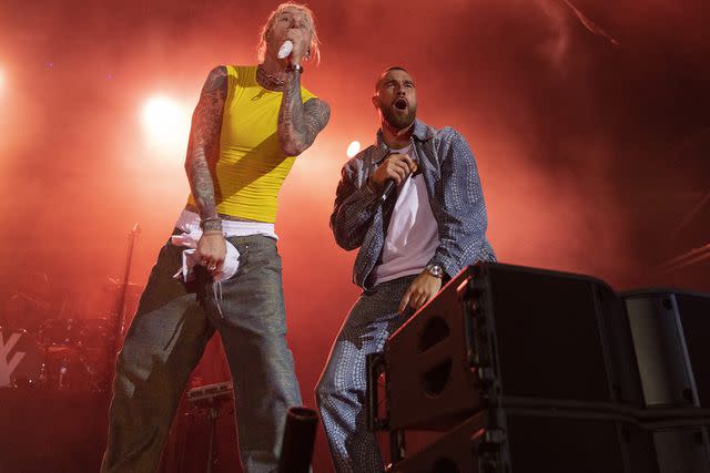 <p>Barry Brecheisen/Getty Images</p> Machine Gun Kelly and Travis Kelce during the 2023 Kelce Jam