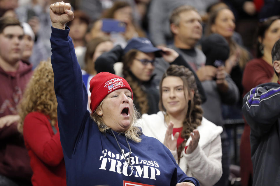 A woman cheers at the start of a campaign rally for President Donald Trump in Bossier City, La., Thursday, Nov. 14, 2019. (AP Photo/Gerald Herbert)