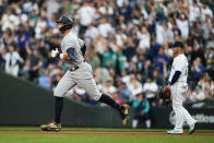 New York Yankees' Aaron Judge jogs the bases after hitting his second home run of the game as Seattle Mariners first baseman Ty France, right, looks at left field during the sixth inning of a baseball game Monday, May 29, 2023, in Seattle. (AP Photo/Lindsey Wasson)