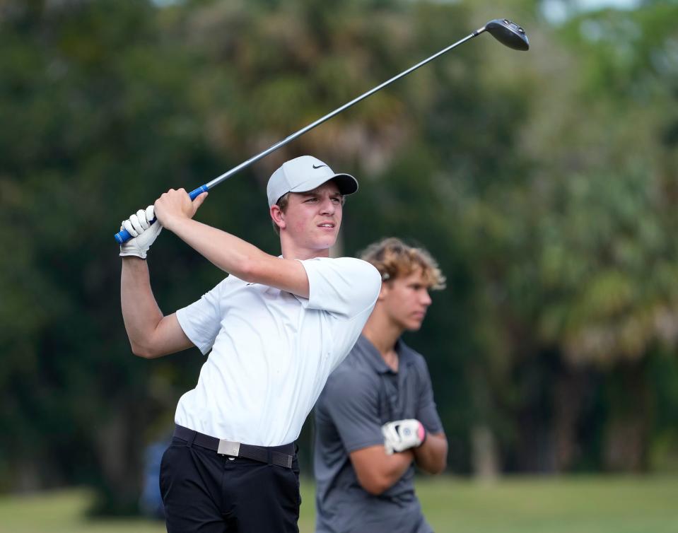 Atlantic's William Froling watches his drive off the No. 16 tee during the District 6-2A Tournament at Daytona Beach Golf Club in Daytona Beach, Monday, Oct. 23, 2023.