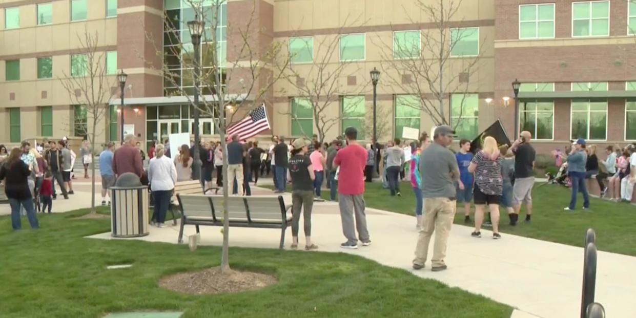 People protesting at Meridian City Hall.