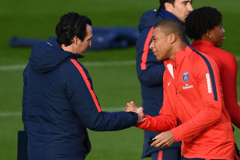 Unai Emery and Mbappe at PSG training