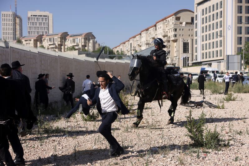 Ultra-Orthodox Jews protest against plans for conscription discussed by Israel's Supreme Court