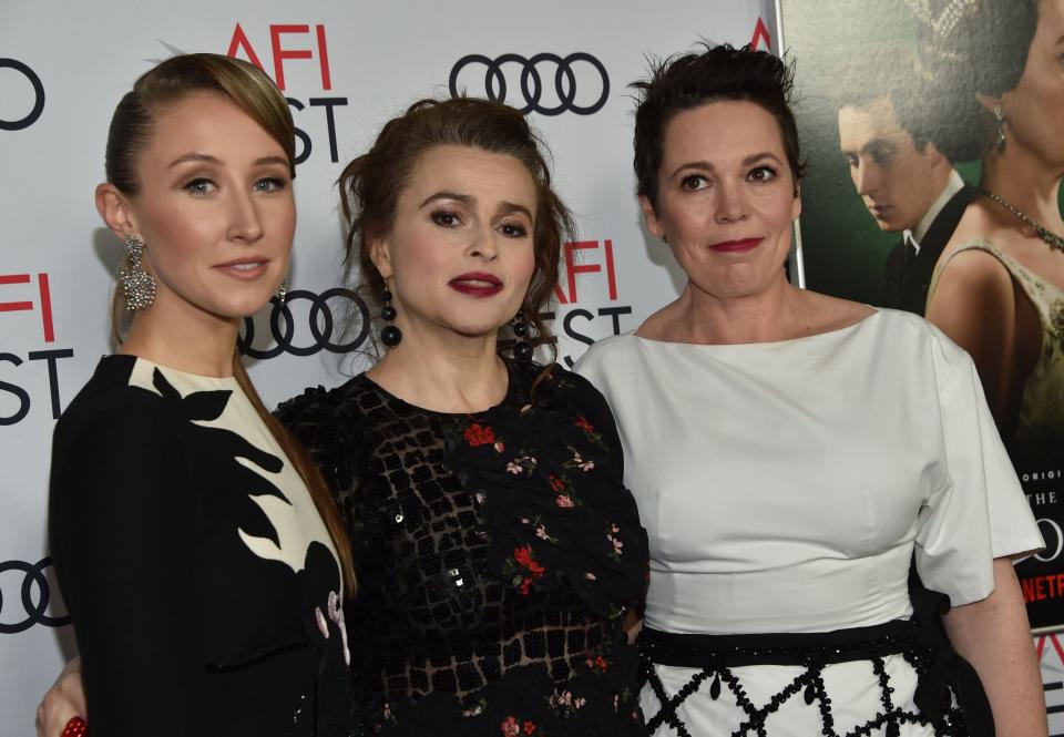 Dohery (left), Bonham Carter and Colman work the red carpet as a team (AFP via Getty Images)