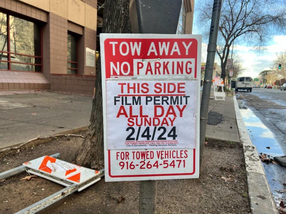 A sign at Sixth and I streets on Thursday in Sacramento shows a tow-away zone for a film permit.