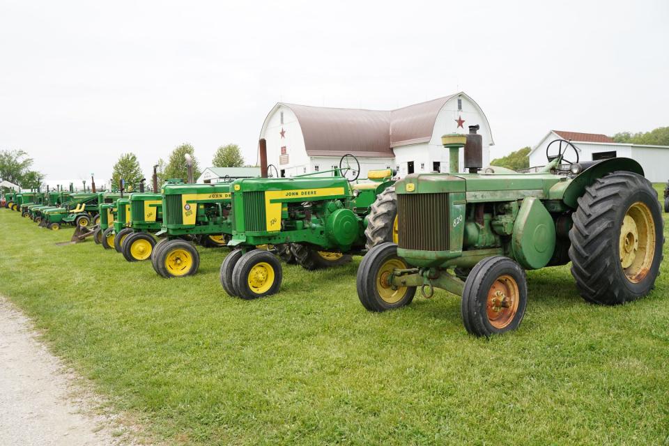 Vintage John Deere tractors, like these pictured May 20, 2022, will be on display this weekend, Sept. 16-18, at the Farmers Antique Tractor & Engine Association's 2022 fall show.