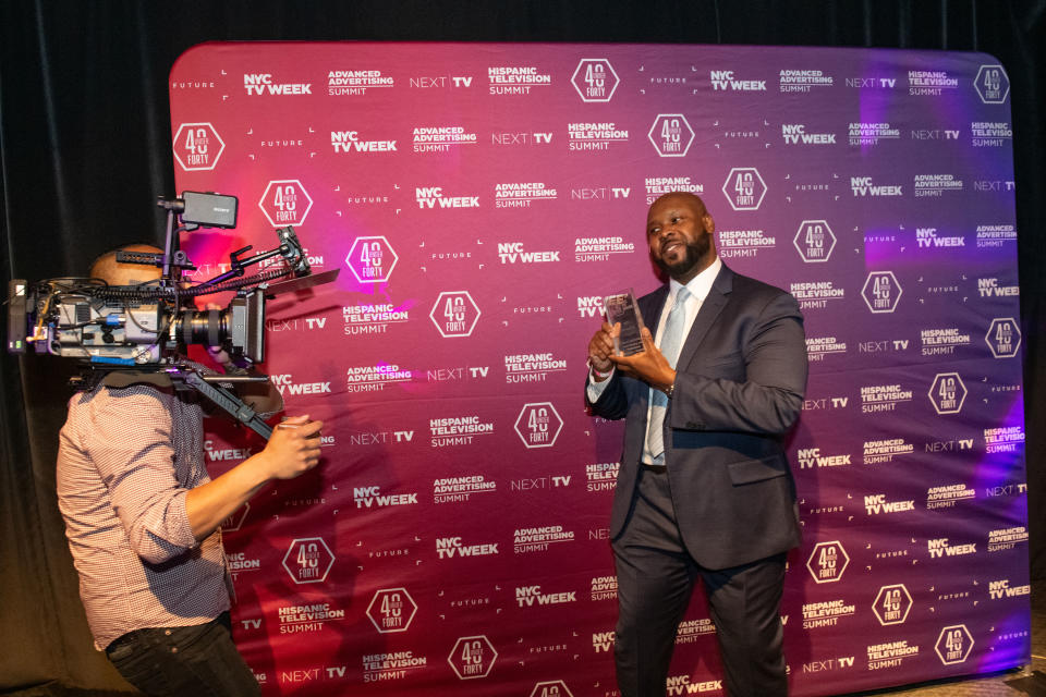 Deon LeCointe, director, networked solutions at Sony, with his trophy.