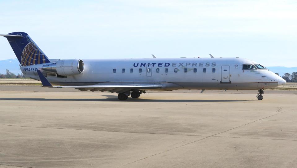 A Record Searchlight file photo of a United Express regional jet.