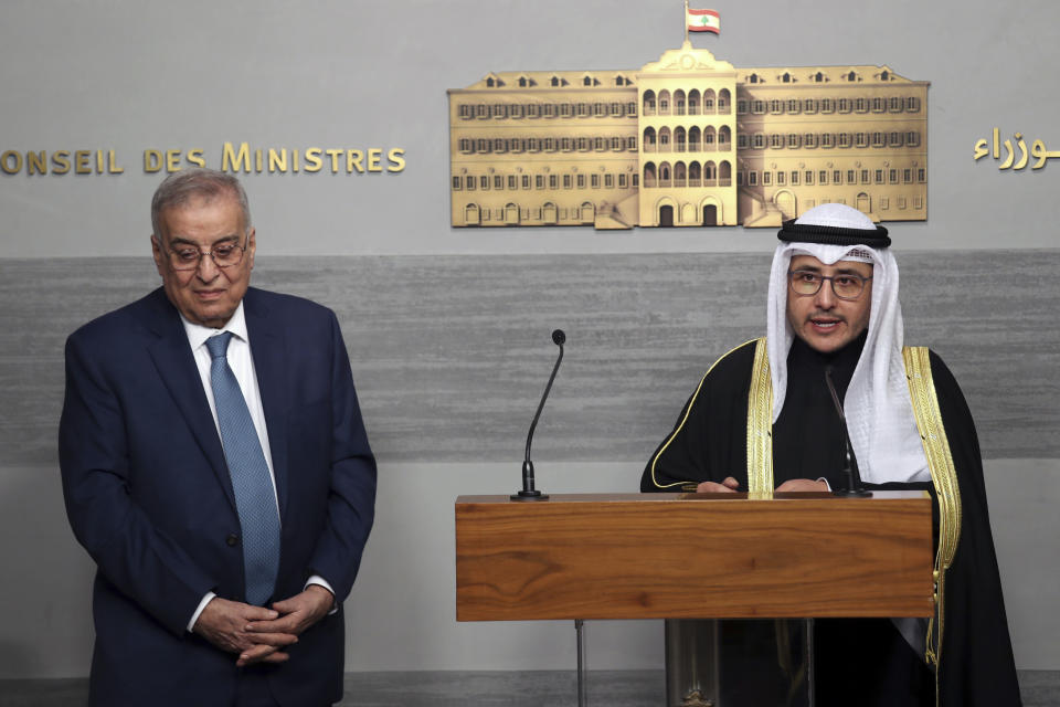 Kuwaiti Foreign Minister Sheikh Ahmad Nasser al-Mohammad al-Sabah, right, speaks during a joint press conference with his Lebanese counterpart Abdallah Bouhabib, in Beirut, Lebanon, Saturday, Jan. 22, 2022. (AP Photo/Bilal Hussein)