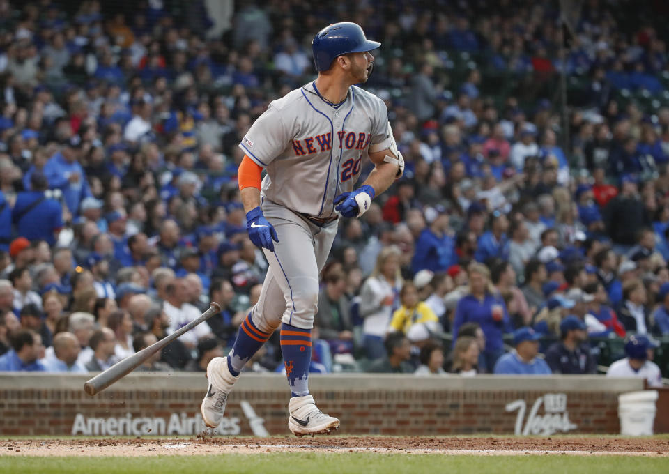 Jun 20, 2019; Chicago, IL, USA; New York Mets first baseman Pete Alonso (20) watches his two run home run against the Chicago Cubs during the third inning at Wrigley Field. Mandatory Credit: Kamil Krzaczynski-USA TODAY Sports