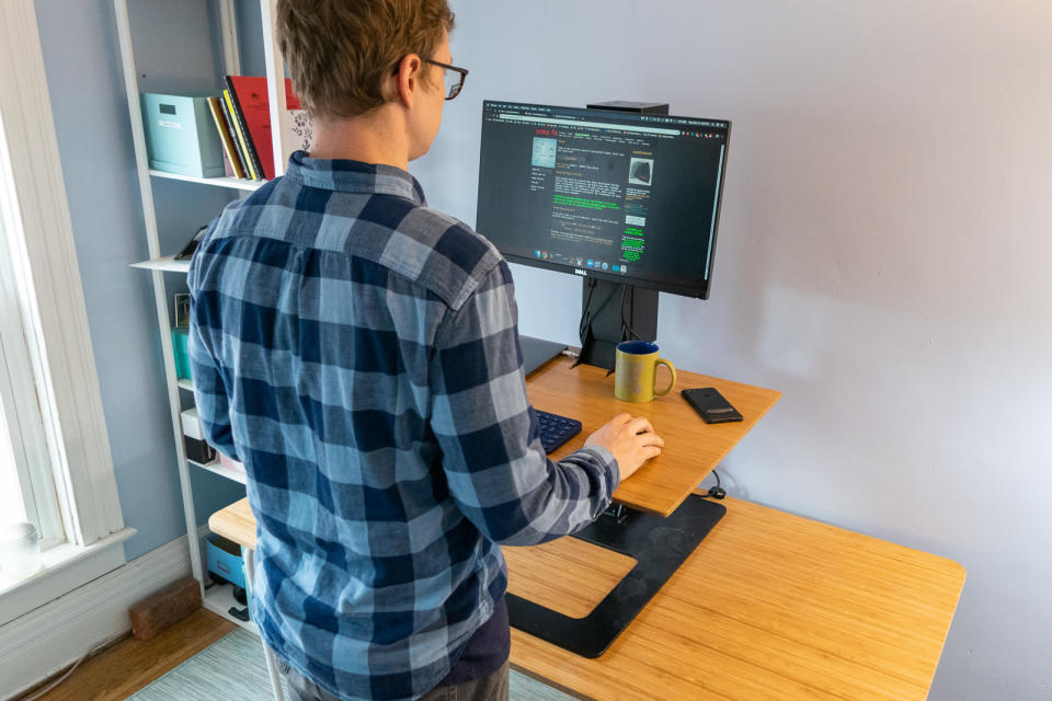 Standing desk converters