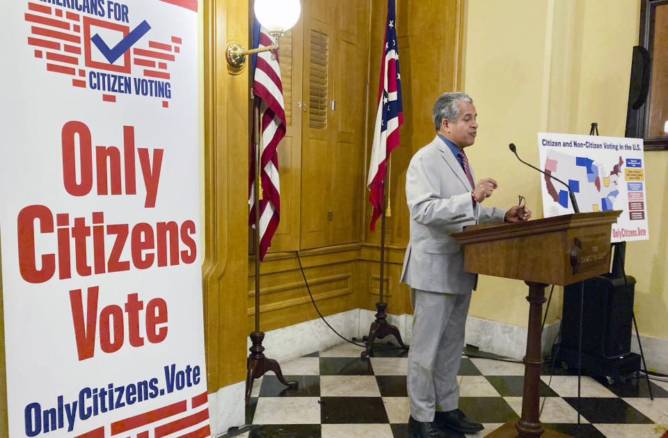 Luis Gil, a Republican candidate for Franklin County Commissioner in central Ohio, speaks in favor of a constitutional amendment on fall ballots that would prohibit noncitizen voting at the Ohio Statehouse in Columbus, Ohio, on Thursday, Oct. 6, 2022. (AP Photo/Julie Carr Smyth)