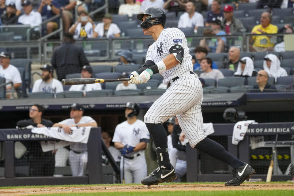 New York Yankees' Aaron Judge watches the ball after hitting a solo home run in the first inning of a baseball game against the Washington Nationals, Thursday, Aug. 24, 2023, in New York. (AP Photo/Mary Altaffer)
