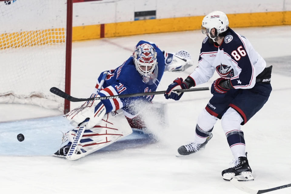 New York Rangers goaltender Igor Shesterkin (31) stops a shot by Columbus Blue Jackets' Kirill Marchenko (86) during the third period of an NHL hockey game Wednesday, Feb. 28, 2024, in New York. (AP Photo/Frank Franklin II)