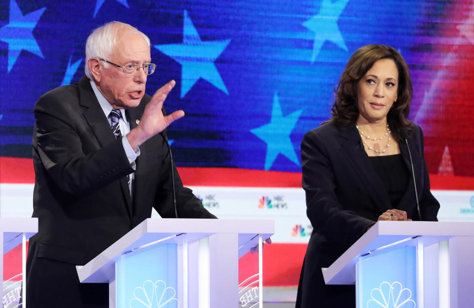 Democratic presidential candidates Sen. Bernie Sanders and Sen. Kamala Harris take part in the second night of the first Democratic presidential debate in June in Miami, Florida. (Photo: Drew Angerer via Getty Images)