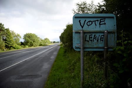 A Vote Leave message is seen on the back of a road sign in Coleraine, Northern Ireland June 28, 2016. REUTERS/Clodagh Kilcoyne