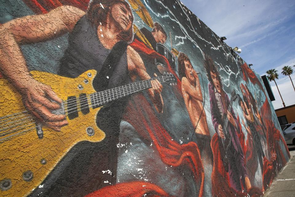 Damage to the AC/DC mural at Club 5 in Indio is seen April 18, 2024.