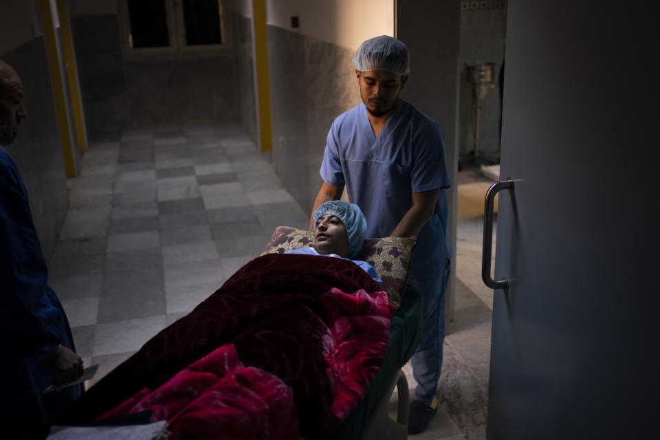 Abdulrahman, 2, is taken to the operating room ahead of his heart surgery at the Tajoura National Heart Center in Tripoli, Libya, on Feb. 25, 2020. (AP Photo/Felipe Dana)