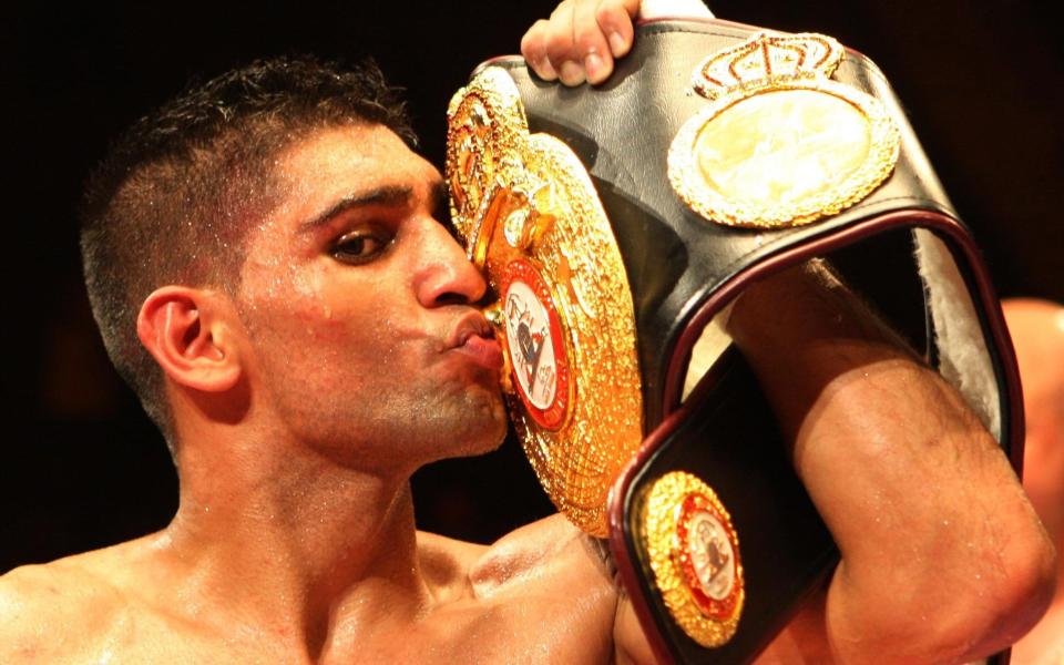 Amir Khan, the 2004 Olympic silver medallist who became a unified world champion at light-welterweight, has announced the end of his in-ring career - Nick Potts/PA Wire