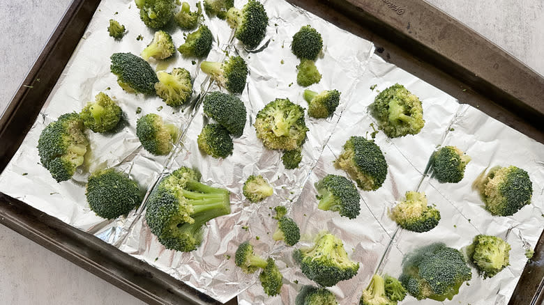 frozen broccoli on baking sheet
