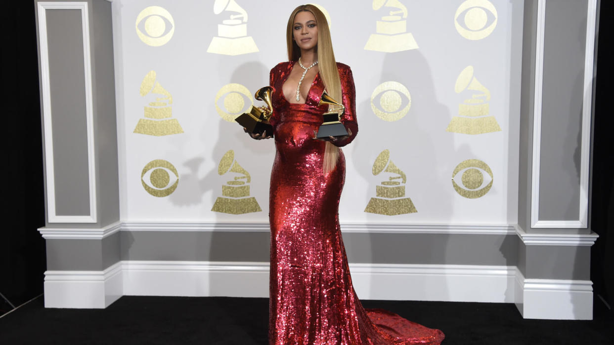 Mandatory Credit: Photo by Invision/AP/REX/Shutterstock (9242032hb)Beyonce poses in the press room with the awards for best music video for "Formation" and best urban contemporary album for "Lemonade" at the 59th annual Grammy Awards at the Staples Center, in Los AngelesThe 59th Annual Grammy Awards - Press Room, Los Angeles, USA - 12 Feb 2017.