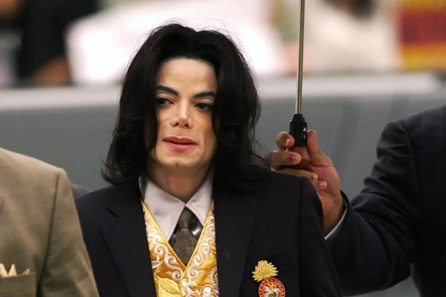 Michael Jackson arrives at the Santa Barbara County Courthouse for his child molestation trial in Santa Maria, Calif., May 25, 2005. (Aaron Lambert/The Santa Maria Times via AP, Pool, File)