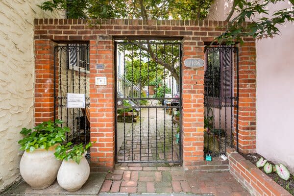 The home sits nestled in a private, gated courtyard in the heart of Washington Square West.