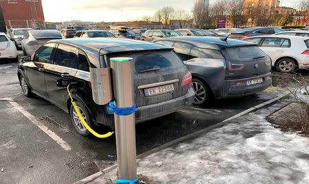 Electric cars are parked in Oslo, Norway January 1, 2019. Picture taken January 1, 2019. REUTERS/Alister Doyle