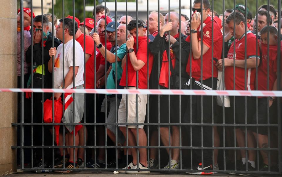 Liverpool fans are seen queuing outside the stadium prior to the UEFA Champions League final match - GETTY IMAGES