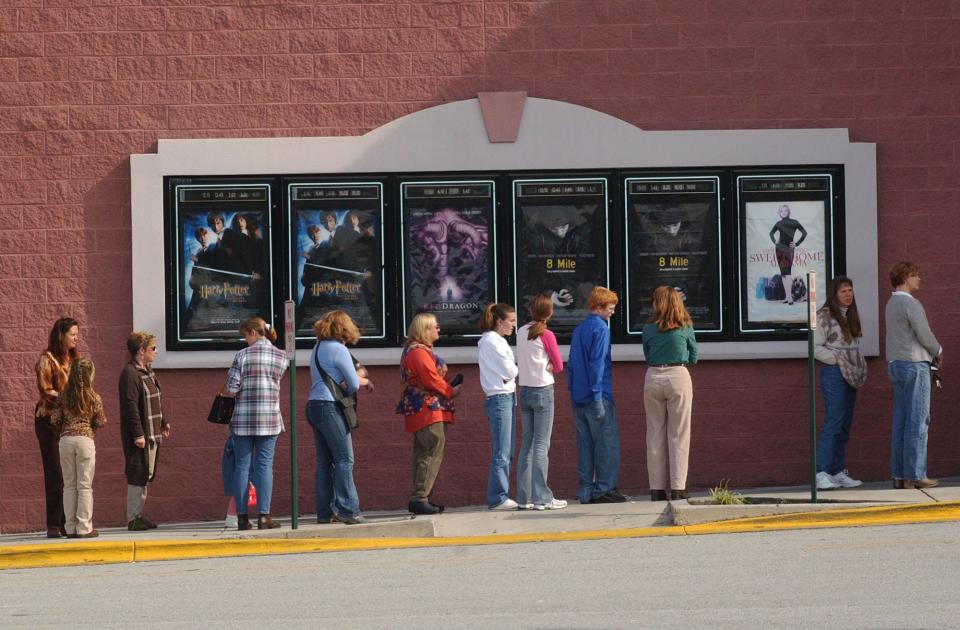 Folks line up to see "Harry Potter and the Chamber of Secrets" at Carmike Cinemas in Wilmington in 2002.