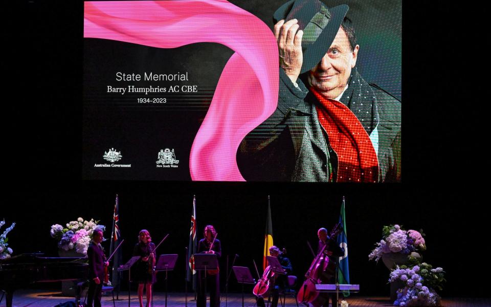 Musicians play during the State Memorial Service for Australian comedian and actor Barry Humphries at the Sydney Opera House
