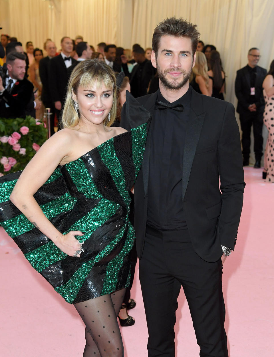 Miley Cyrus and Liam Hemsworth arrive for the 2019 Met Gala celebrating Camp: Notes on Fashion at the Metropolitan Museum of Art on May 6, 2019 in New York City. (Photo: Karwai Tang via Getty Images)