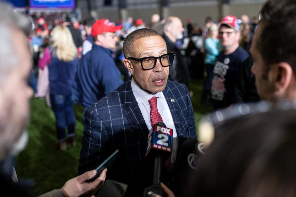 Republican gubernatorial candidate James Craig speaks to media during a Save America rally at the Michigan Stars Sports Center in Washington Township on April 2, 2022.