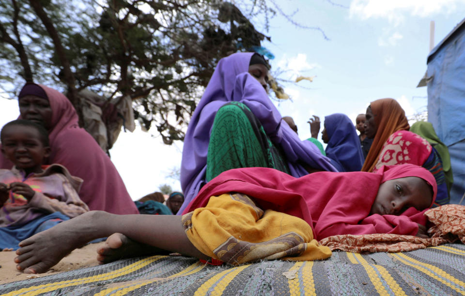 Somalis families, displaced after fleeing Southern Somalia amid an uptick in U.S. airstrikes, rests at an IDP camp near Mogadishu, on Mar. 12, 2020. | Feisal Omar—Reuters.